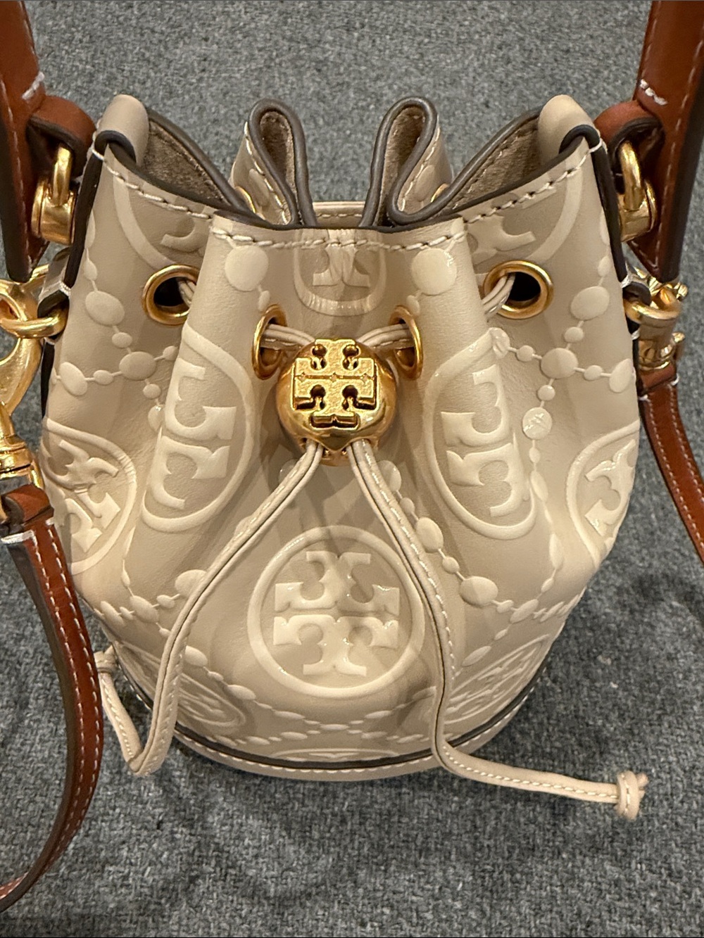 Tory Burch Beige Embossed Monogram Mini Bucket Bag - Picture 2 of 11